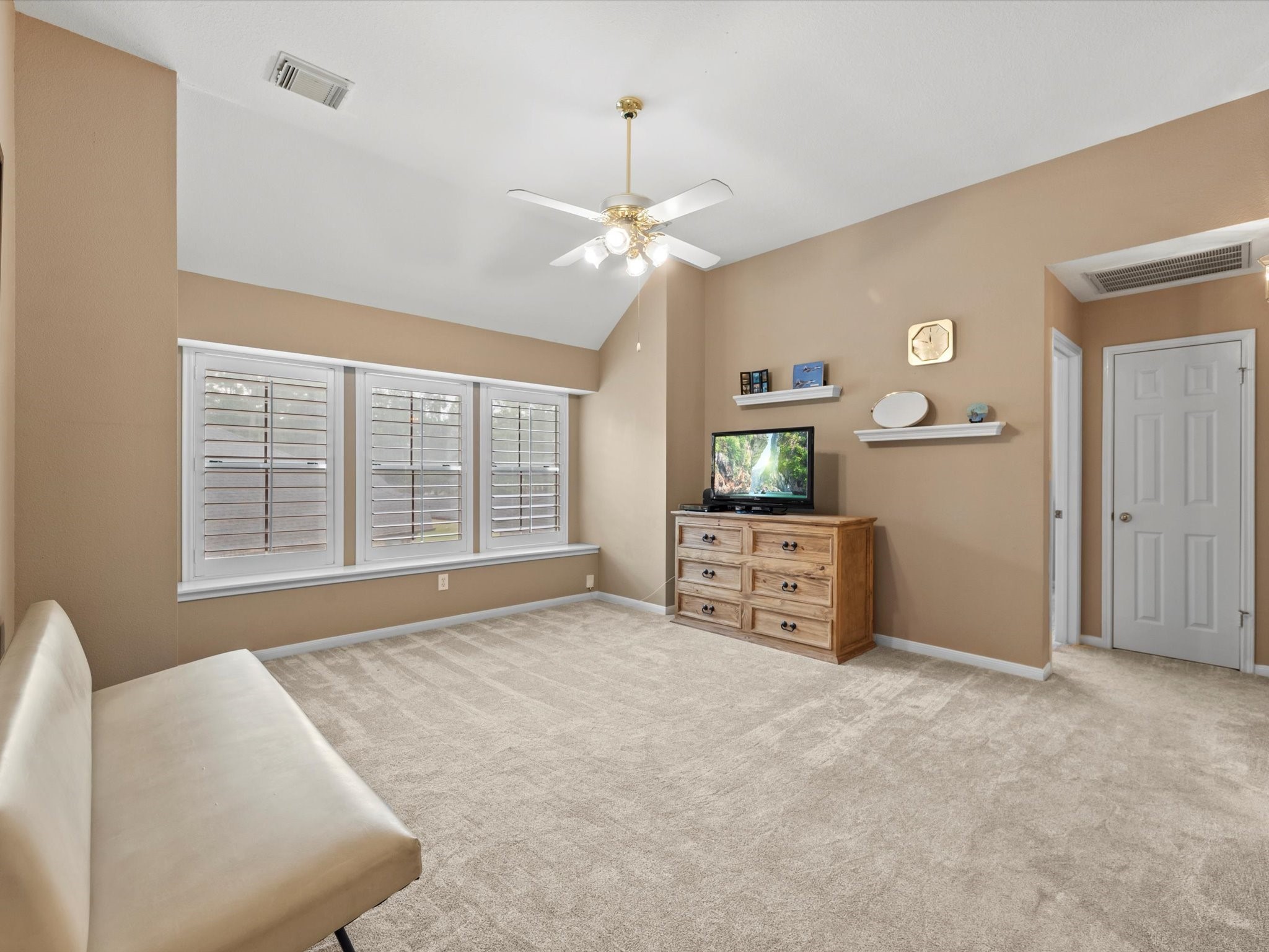 911 Chinni Court Houston, TX 77094 - Photo 24 of 31 a bedroom with furniture and a large window