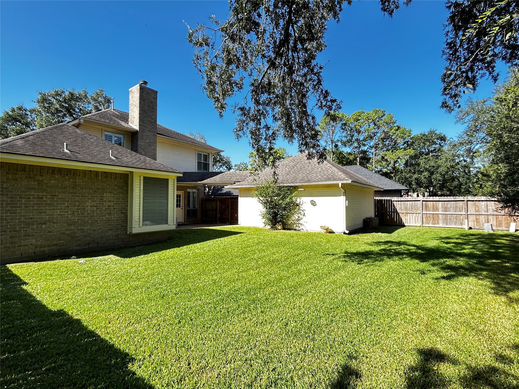 911 Chinni Court Houston, TX 77094 - Photo 31 of 31 a front view of a house with garden