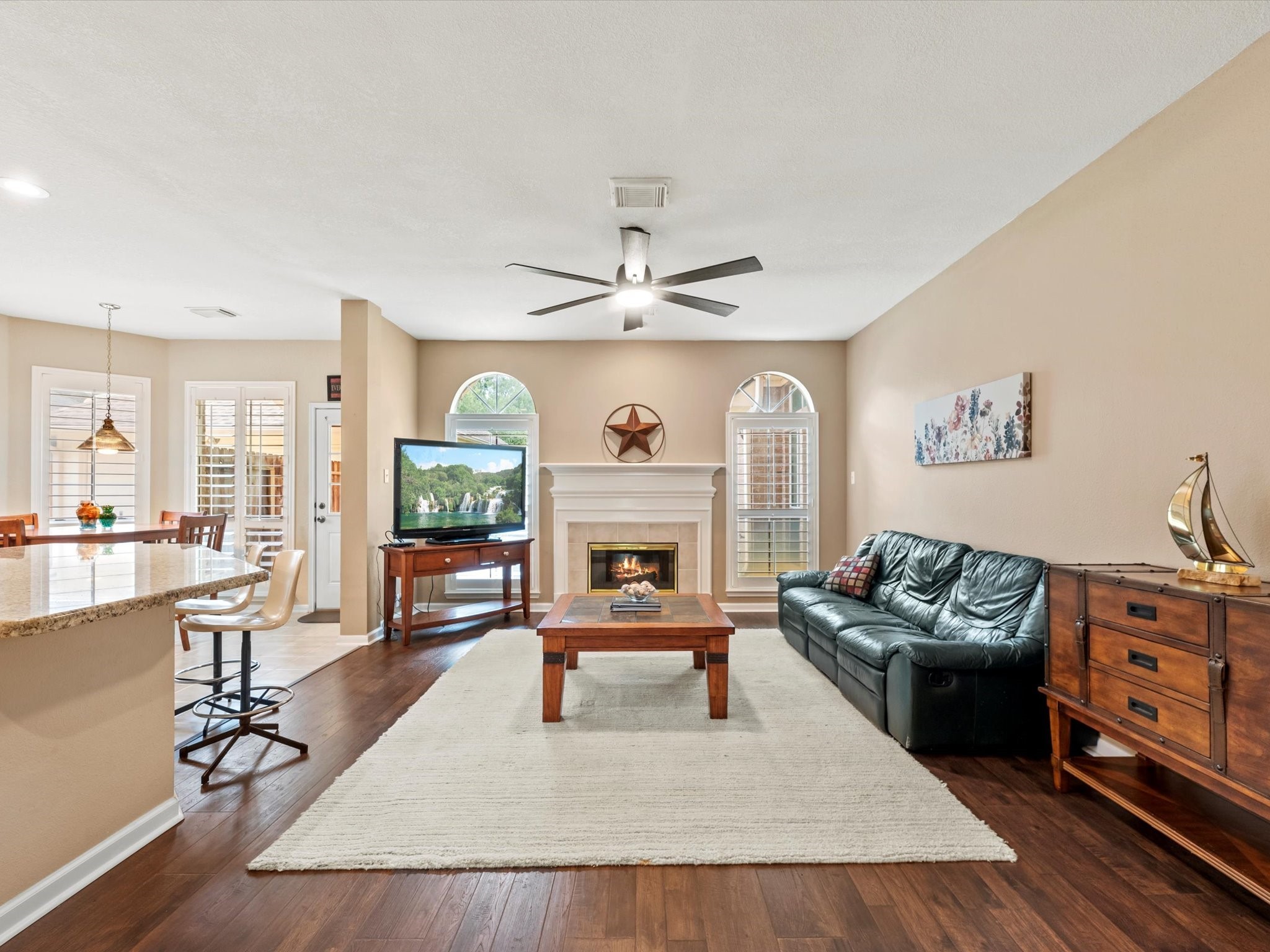 911 Chinni Court Houston, TX 77094 - Photo 10 of 31 a living room with furniture and a fireplace