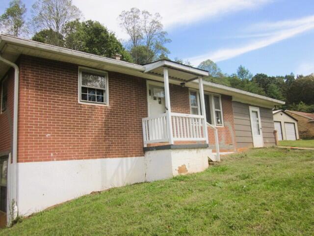 4043 Henry Road Ferrum, VA 24088 - Photo 12 of 14 a front view of a house with a yard