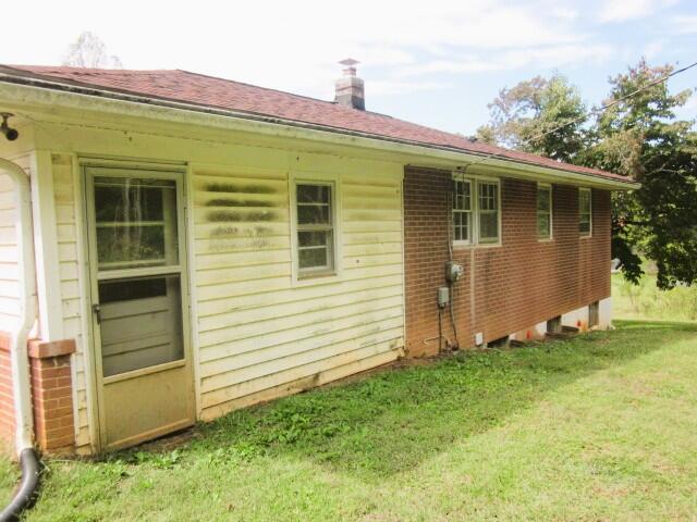 4043 Henry Road Ferrum, VA 24088 - Photo 14 of 14 a front view of a house with garden