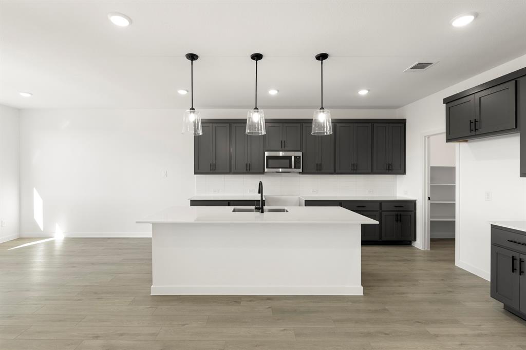 1222 Watercrest Street Forney, TX 75126 - Photo 8 of 29 08. 1222 Watercrest - Kitchen