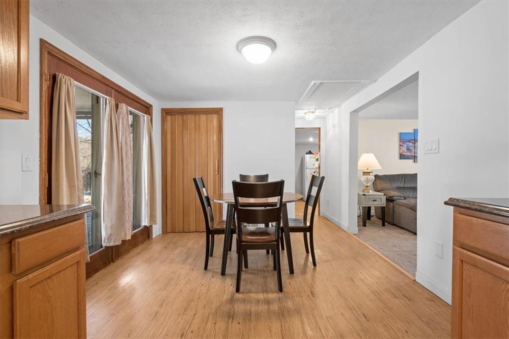 131 Ridgewood Road Coraopolis, PA 15108 - Photo 11 of 39 a dining room with furniture and wooden floor