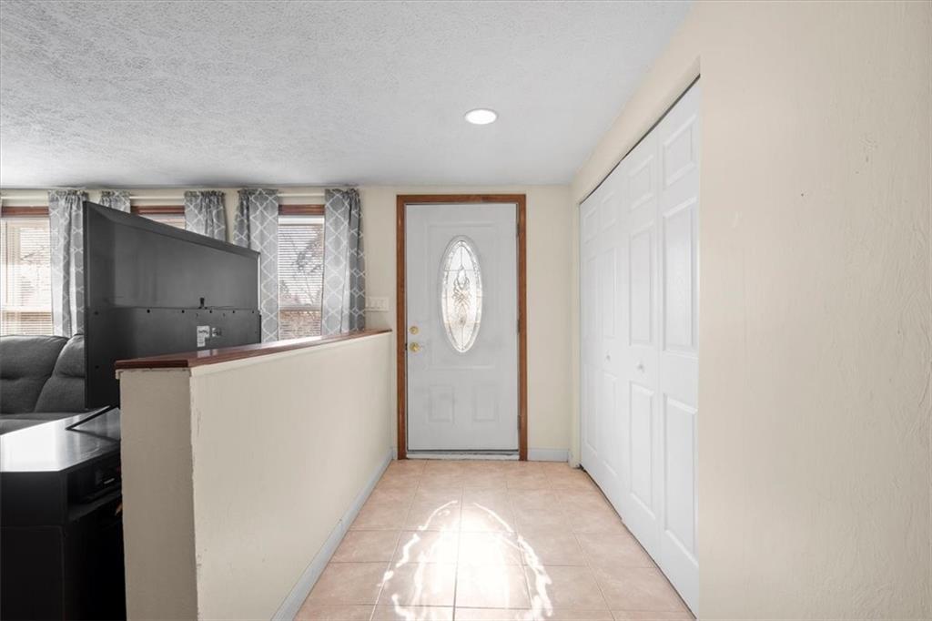 131 Ridgewood Road Coraopolis, PA 15108 - Photo 7 of 39 a view of livingroom with hardwood floor and workspace