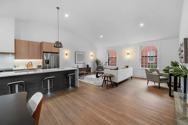 a workspace with furniture and wooden floor