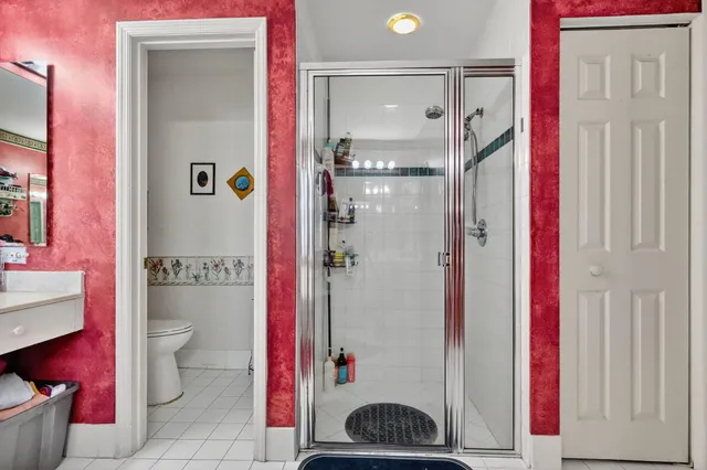 a bathroom with a shower curtain