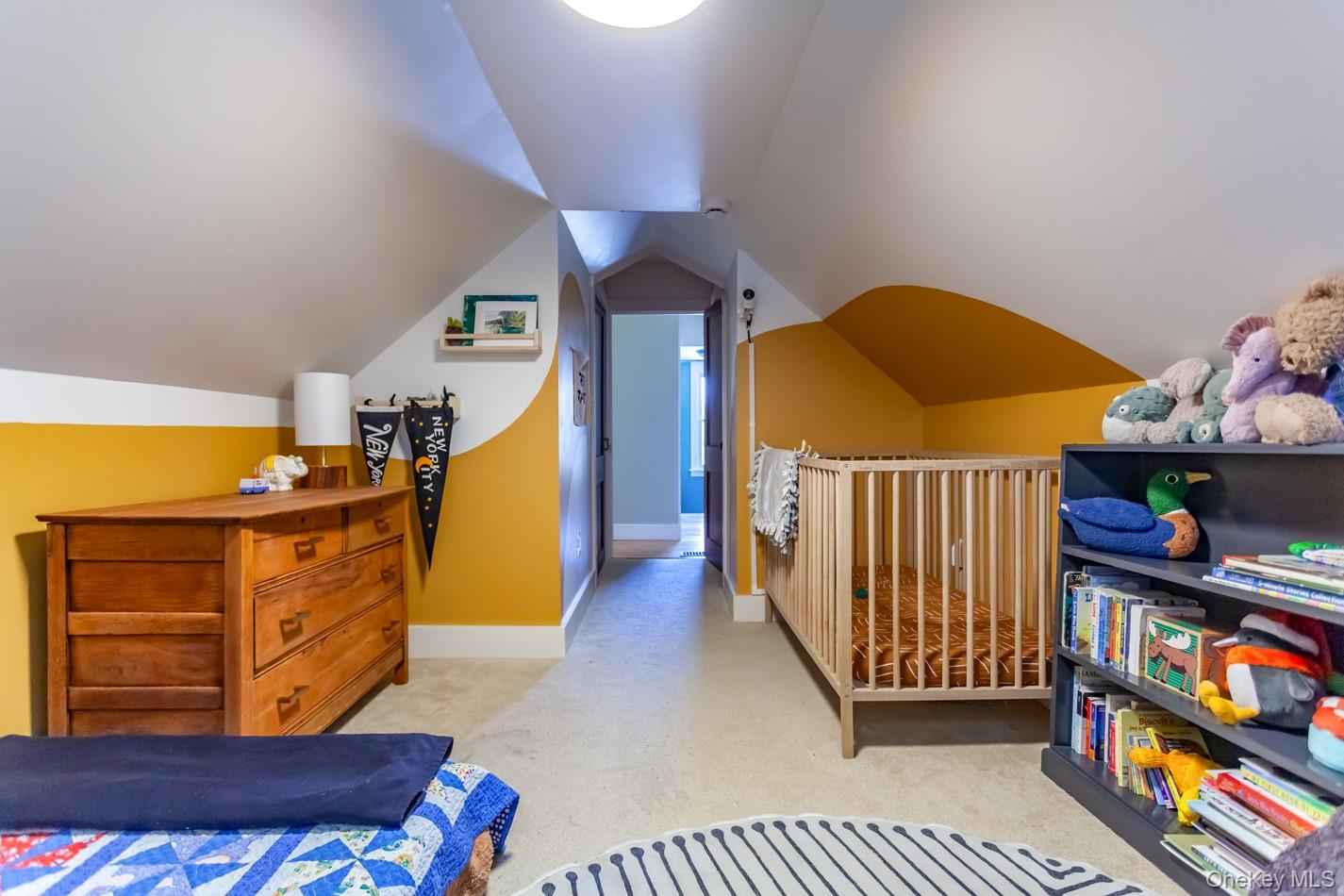 1710 Highway 9D Cold Spring, NY 10516 - Photo 18 of 41 Bedroom with light colored carpet and vaulted ceiling