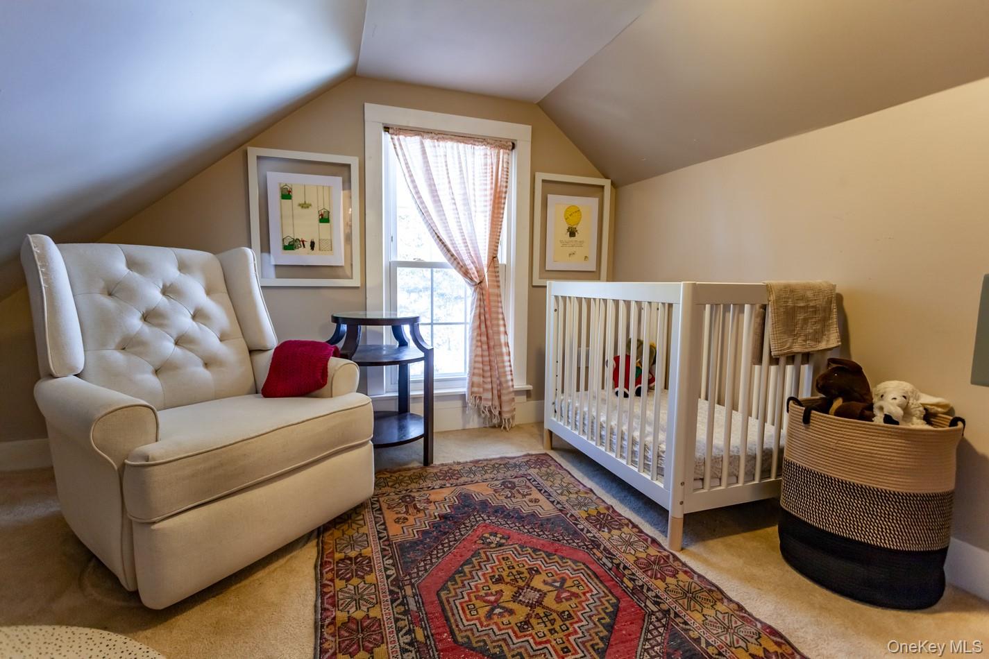 1710 Highway 9D Cold Spring, NY 10516 - Photo 21 of 41 Bedroom with a crib, lofted ceiling, and light carpet