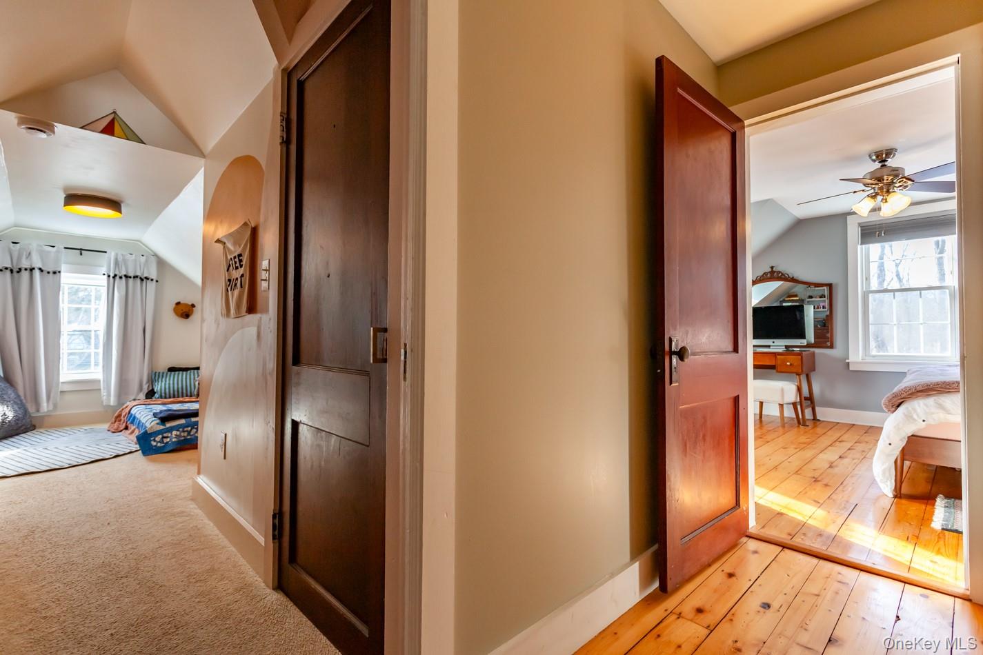 1710 Highway 9D Cold Spring, NY 10516 - Photo 22 of 41 Corridor with vaulted ceiling and light wood-style floors
