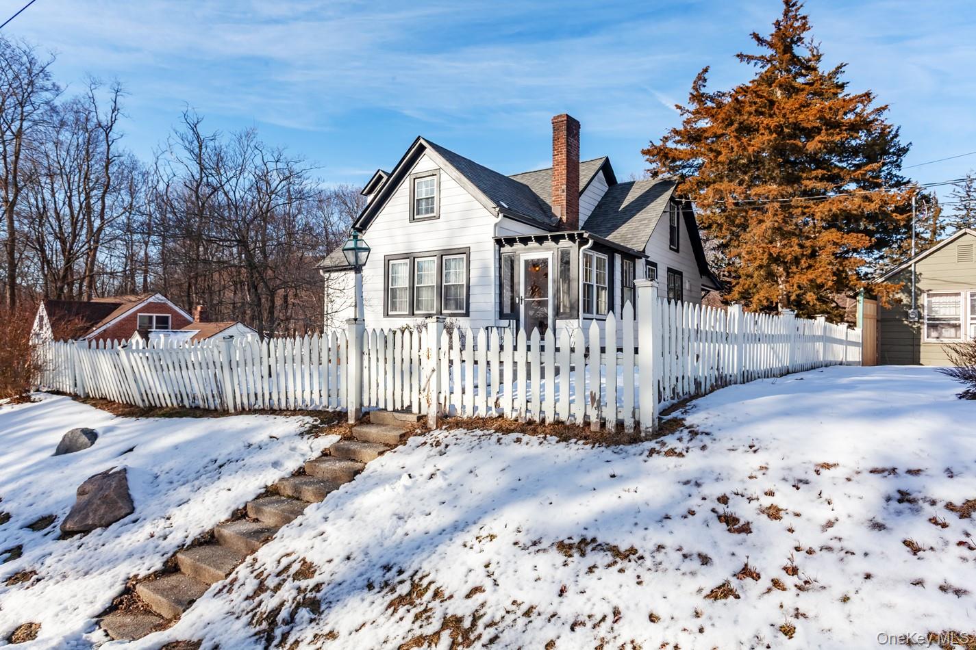 1710 Highway 9D Cold Spring, NY 10516 - Photo 39 of 41 View of front of home with a fenced front yard and a chimney