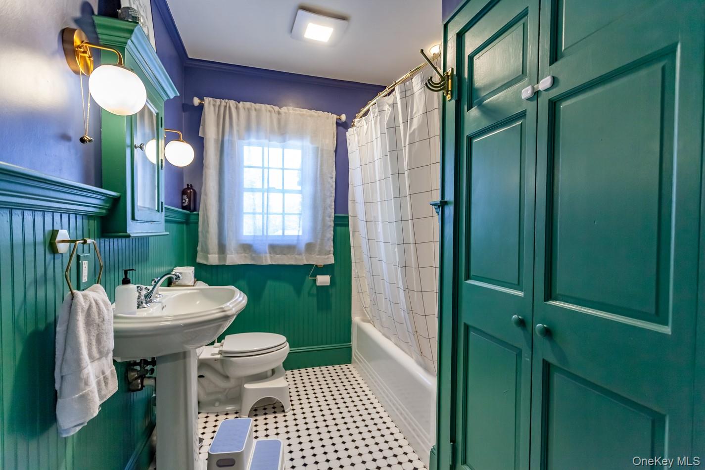 1710 Highway 9D Cold Spring, NY 10516 - Photo 9 of 41 Bathroom with a wainscoted wall, shower / bath combo with shower curtain, and tile patterned flooring