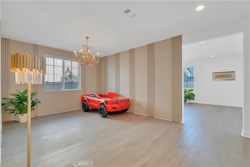 3445 Spring Wheat Street Perris, CA 92570 - Photo 8 of 64 Downstairs bonus room/Dining Room