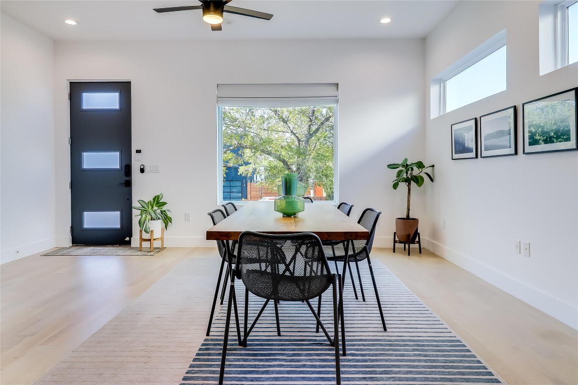 4712 Reyes Street, Unit 1 Austin, TX 78721 - Photo 13 of 40 a dining room with furniture and window