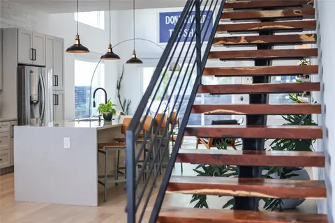 a bathroom with a shower and a toilet