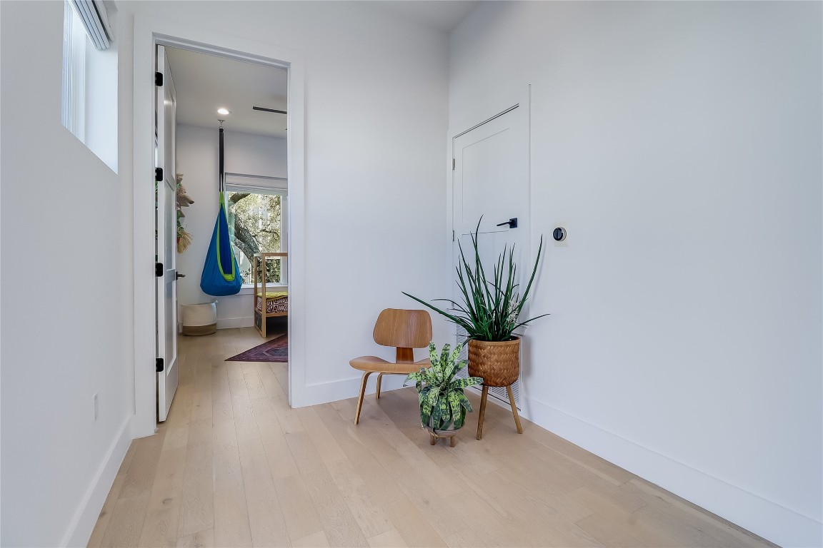 4712 Reyes Street, Unit 1 Austin, TX 78721 - Photo 19 of 40 an entryway with a potted plant