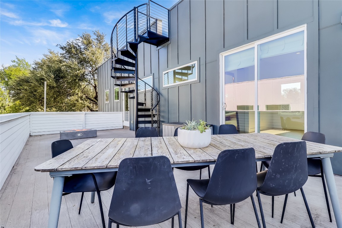 4712 Reyes Street, Unit 1 Austin, TX 78721 - Photo 27 of 40 a view of a dining room with furniture window and wooden floor