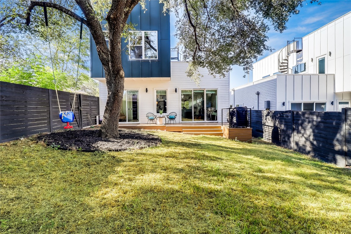 4712 Reyes Street, Unit 1 Austin, TX 78721 - Photo 30 of 40 a view of a fountain in the backyard of a house