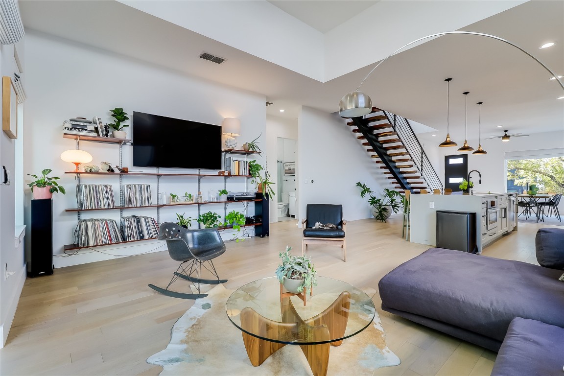 4712 Reyes Street, Unit 1 Austin, TX 78721 - Photo 6 of 40 a living room with furniture and a flat screen tv
