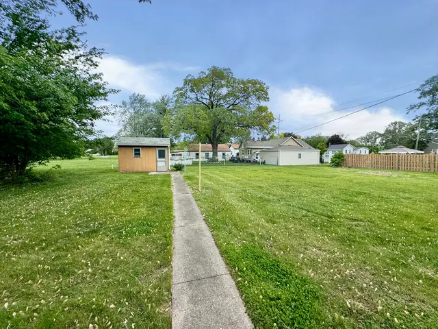 a view of a backyard with a garden