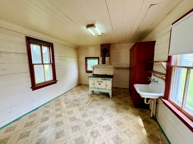 a room with furniture and a window