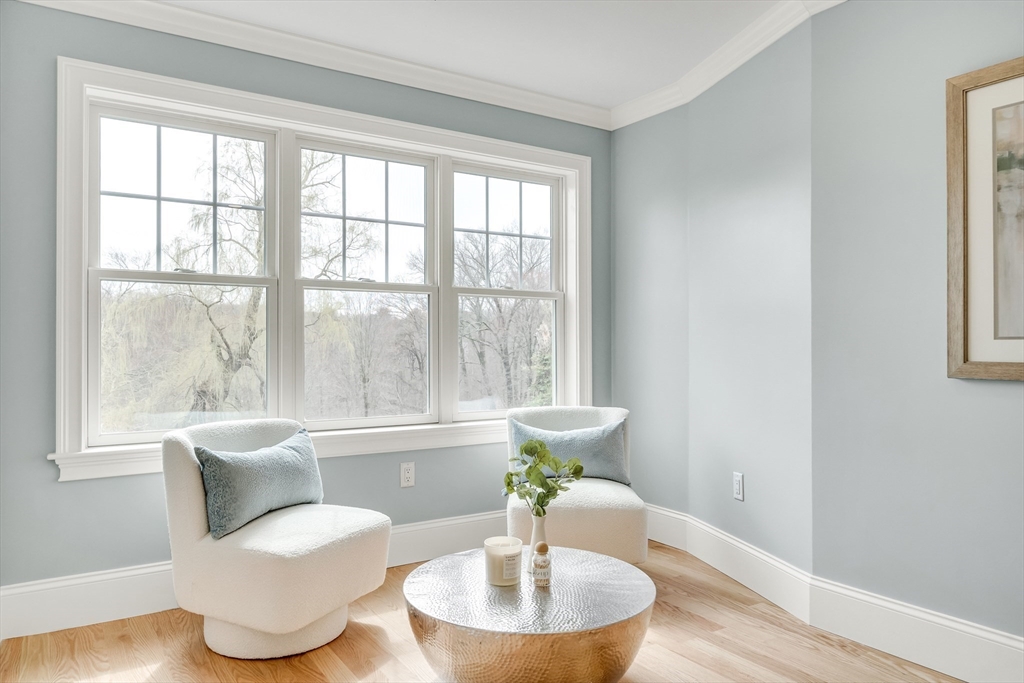 232 Lincoln Street Lexington, MA 02421 - Photo 21 of 41 a living room with furniture and a large window