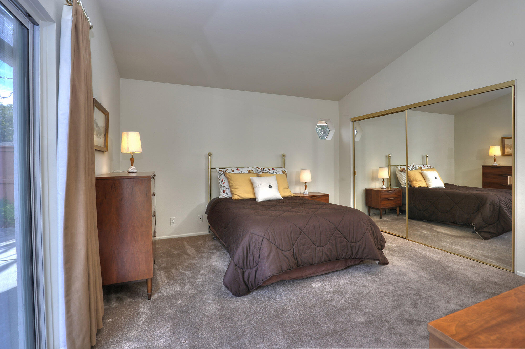 6061 Berkeley Road Goleta, CA 93117 - Photo 11 of 23 a bedroom with a bed and window