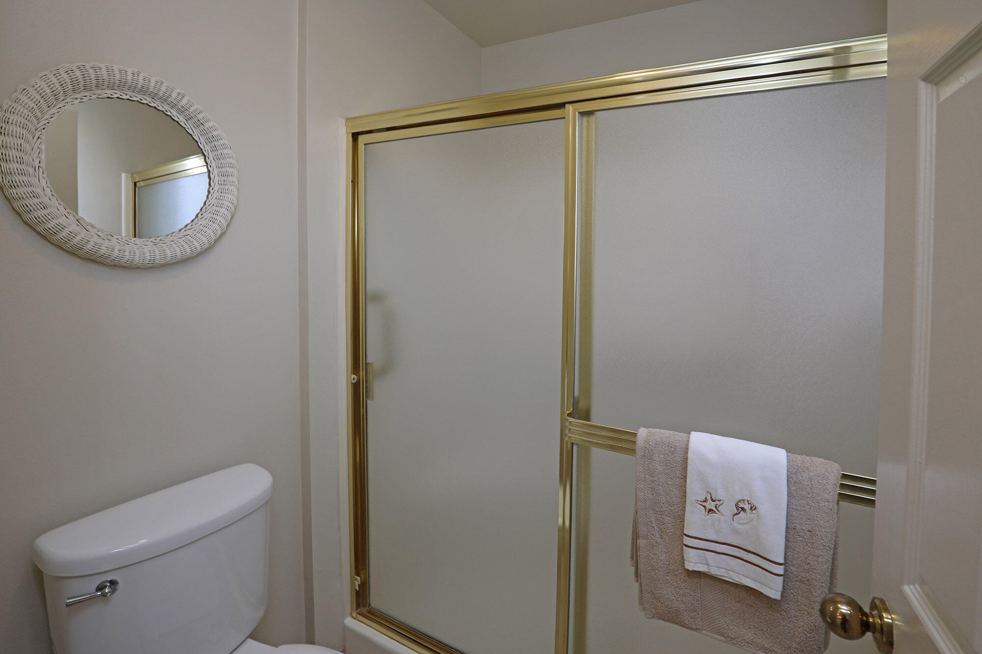6061 Berkeley Road Goleta, CA 93117 - Photo 17 of 23 a bathroom with a shower and a toilet
