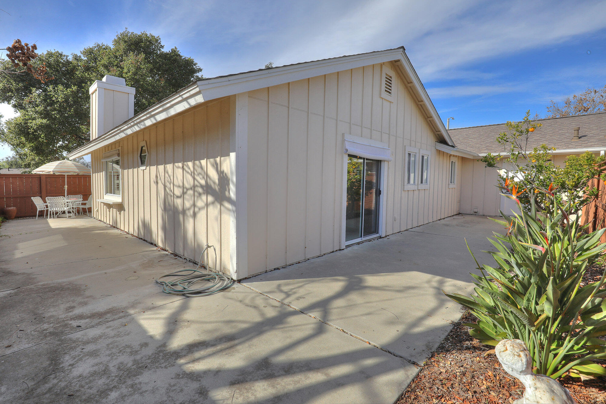 6061 Berkeley Road Goleta, CA 93117 - Photo 22 of 23 a view of a house with a wooden fence