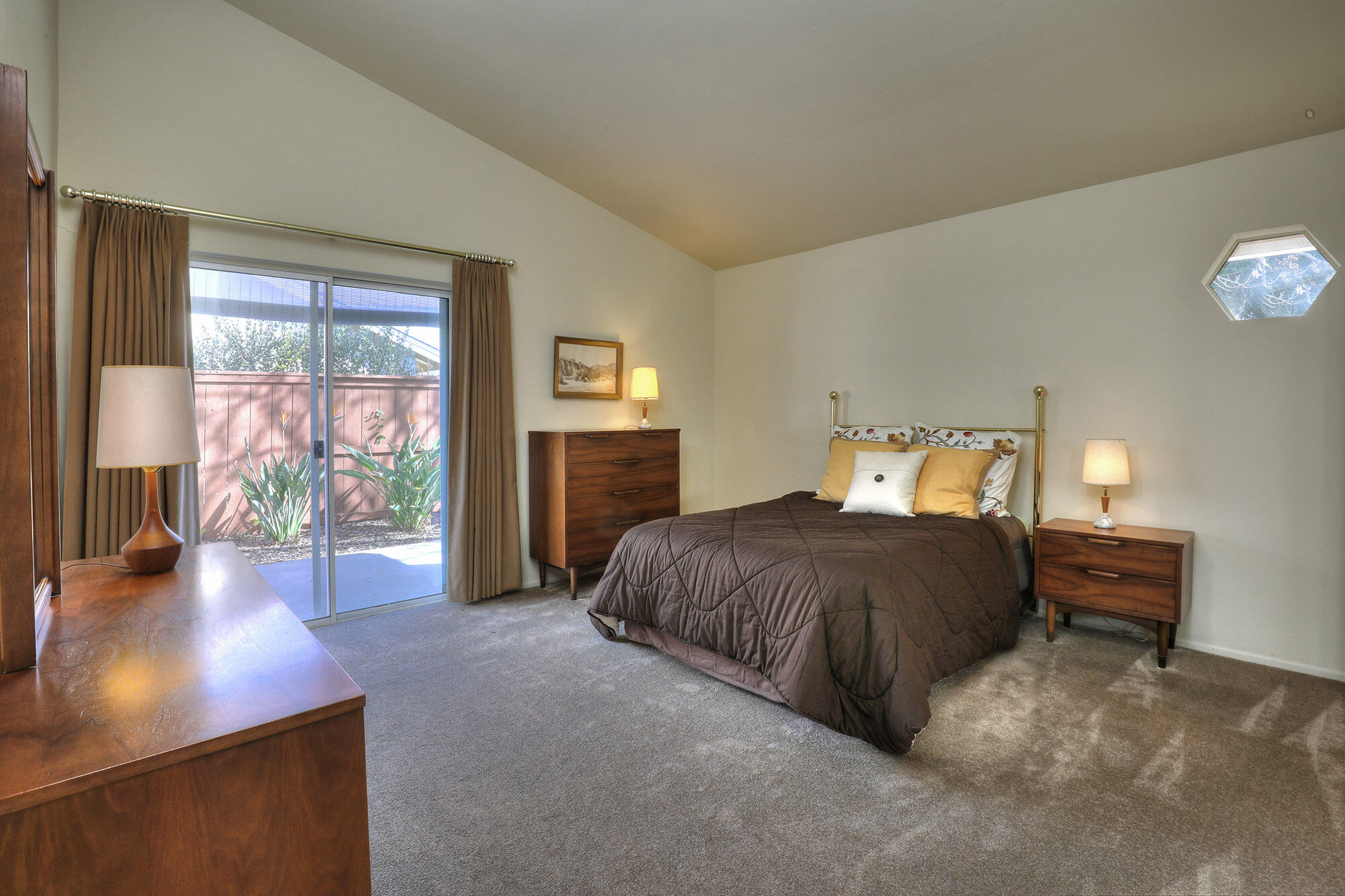 6061 Berkeley Road Goleta, CA 93117 - Photo 9 of 23 a bedroom with a bed and window