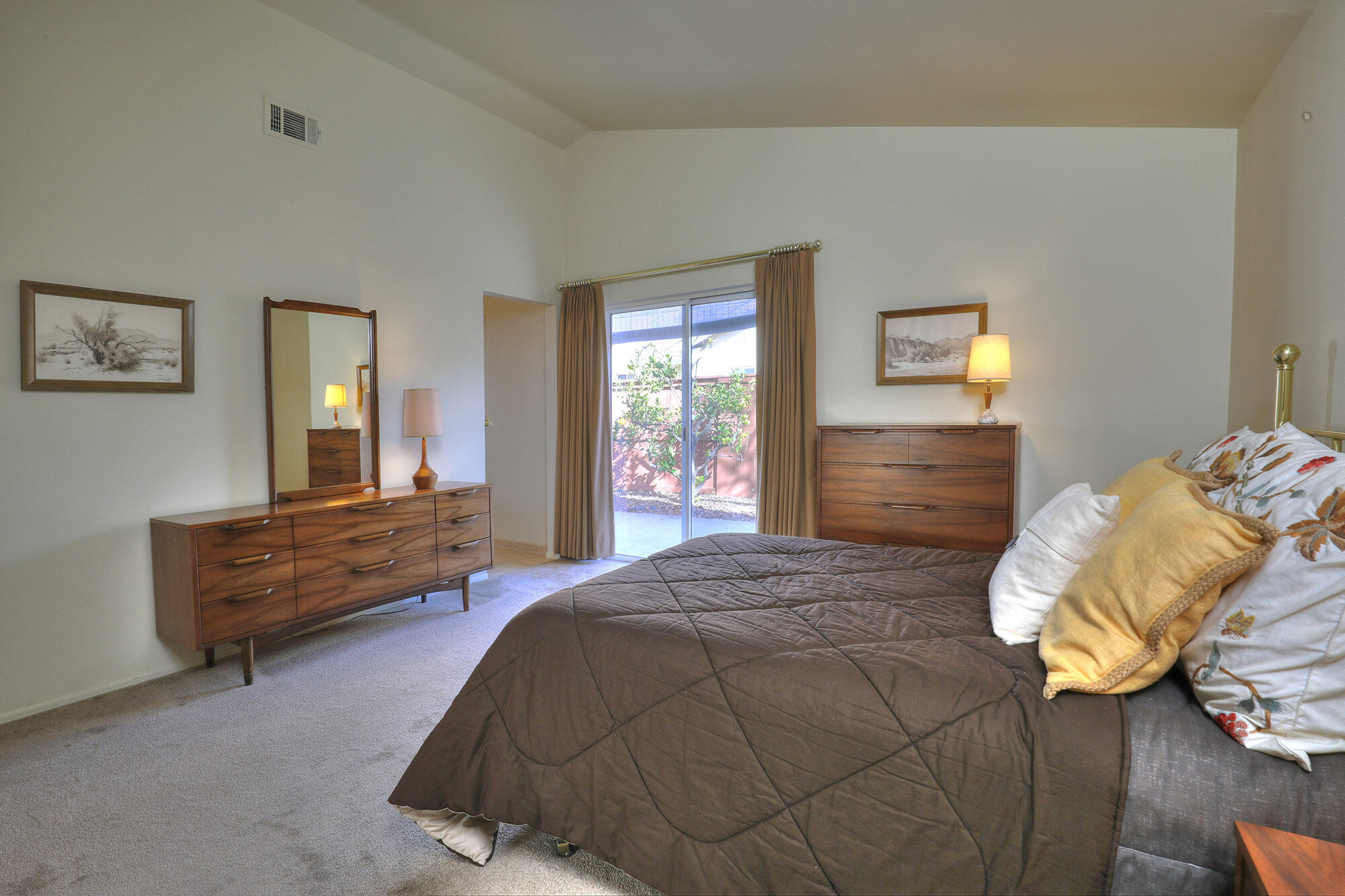 6061 Berkeley Road Goleta, CA 93117 - Photo 10 of 23 a bedroom with a bed and a window