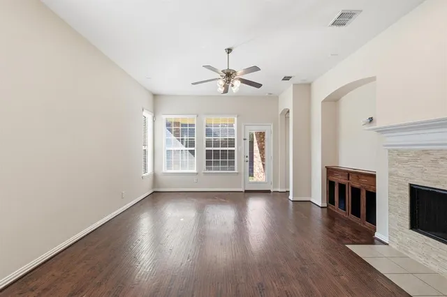 a bathroom with a granite countertop sink double and mirror