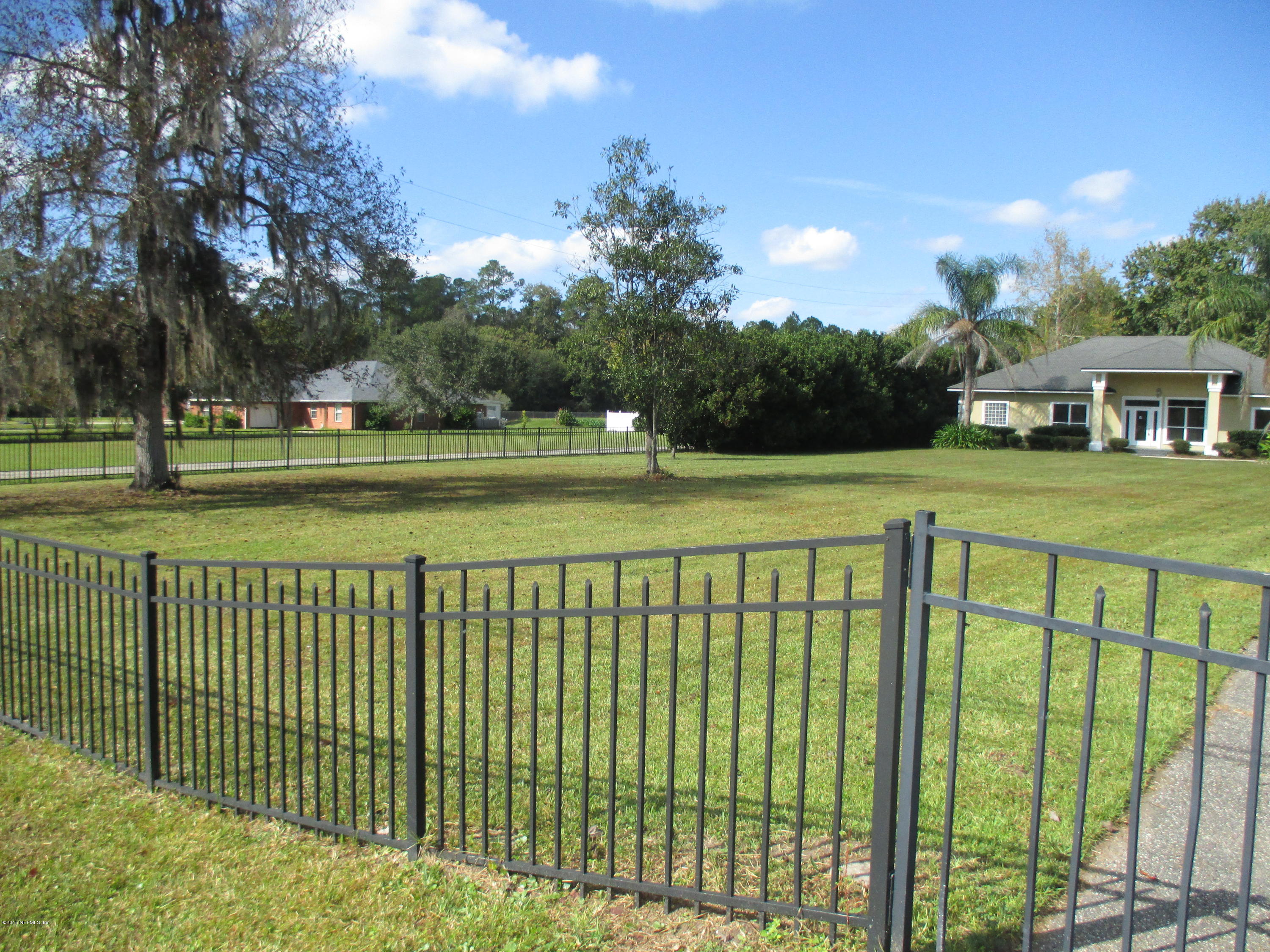 5557 Ada Johnson Road Jacksonville, FL 32218 - Photo 7 of 31 Iron Fence