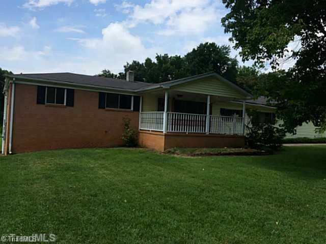 Exterior Front. Ranch home with a porch