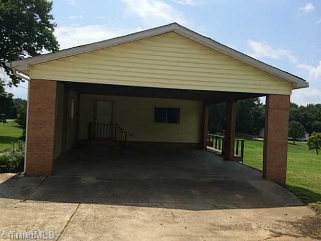6613 Alley Road Summerfield, NC 27358 - Photo 12 of 14 Exterior Front. Huge carport