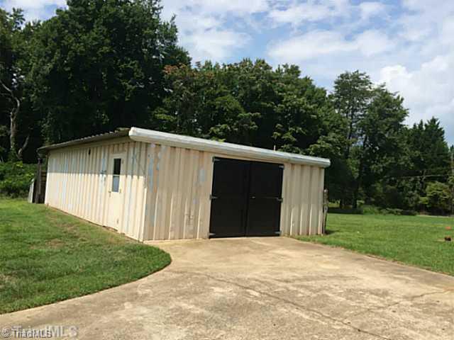 6613 Alley Road Summerfield, NC 27358 - Photo 13 of 14 Exterior Front. Shed / Garrage for your hobbies