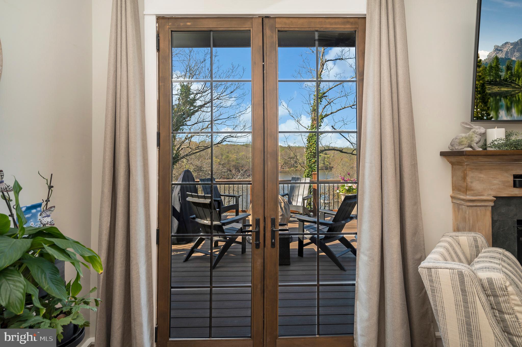 8080 Longtree Road Manassas, VA 20112 - Photo 20 of 66 Living area w/ 8' French doors to expansive deck.