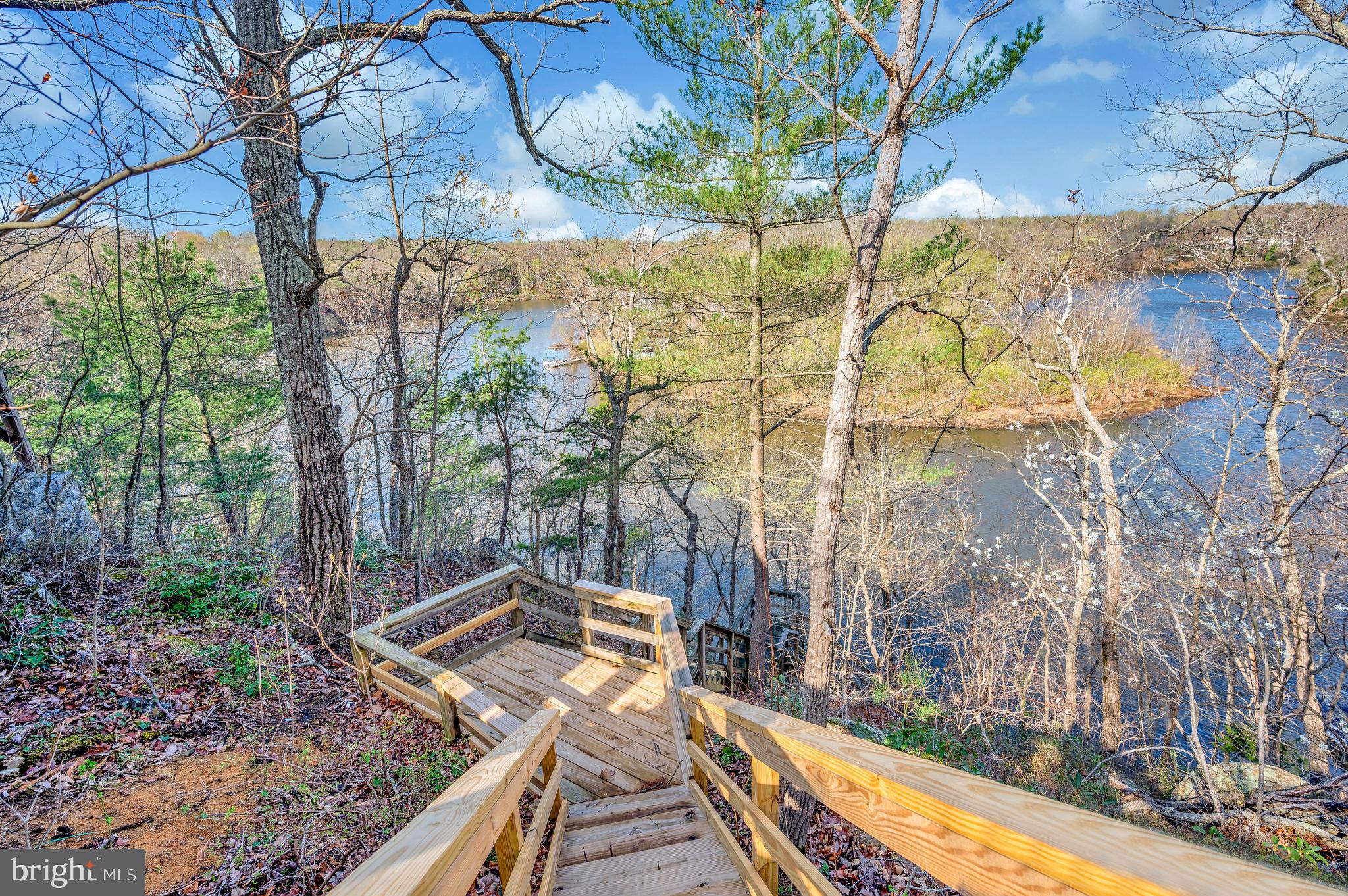 8080 Longtree Road Manassas, VA 20112 - Photo 62 of 66 Staircase w/landing leads to floating boat ramp.