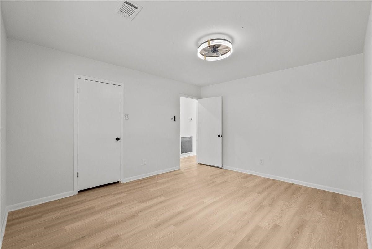 5762 Birdwood Road Houston, TX 77096 - Photo 18 of 49 BEDROOM #2 ALSO TOWARDS FRONT OF HOME WITH AMPLE CLOSET SPACE.