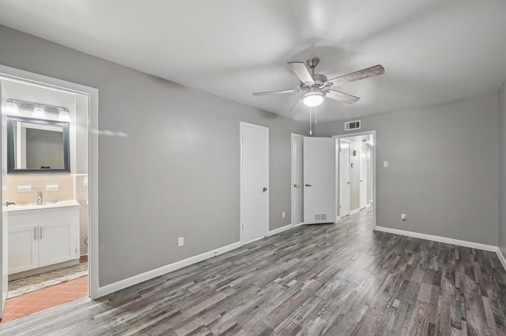 6151 East Mockingbird Lane Dallas, TX 75214 - Photo 5 of 8 wooden floor in an empty room