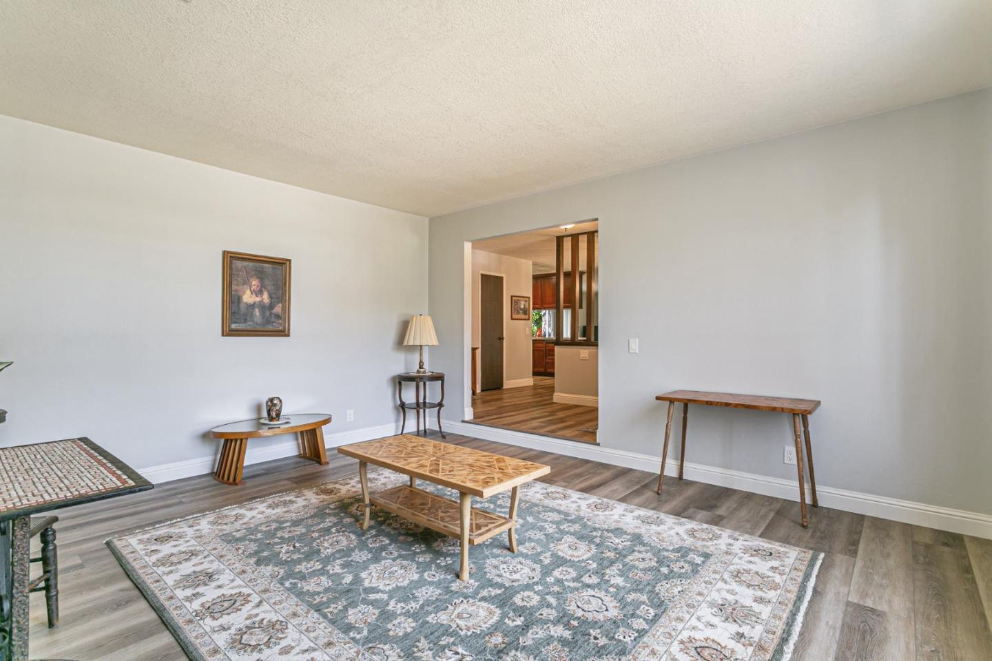 970 Ortega Circle Gilroy, CA 95020 - Photo 12 of 26 a living room with furniture and a rug