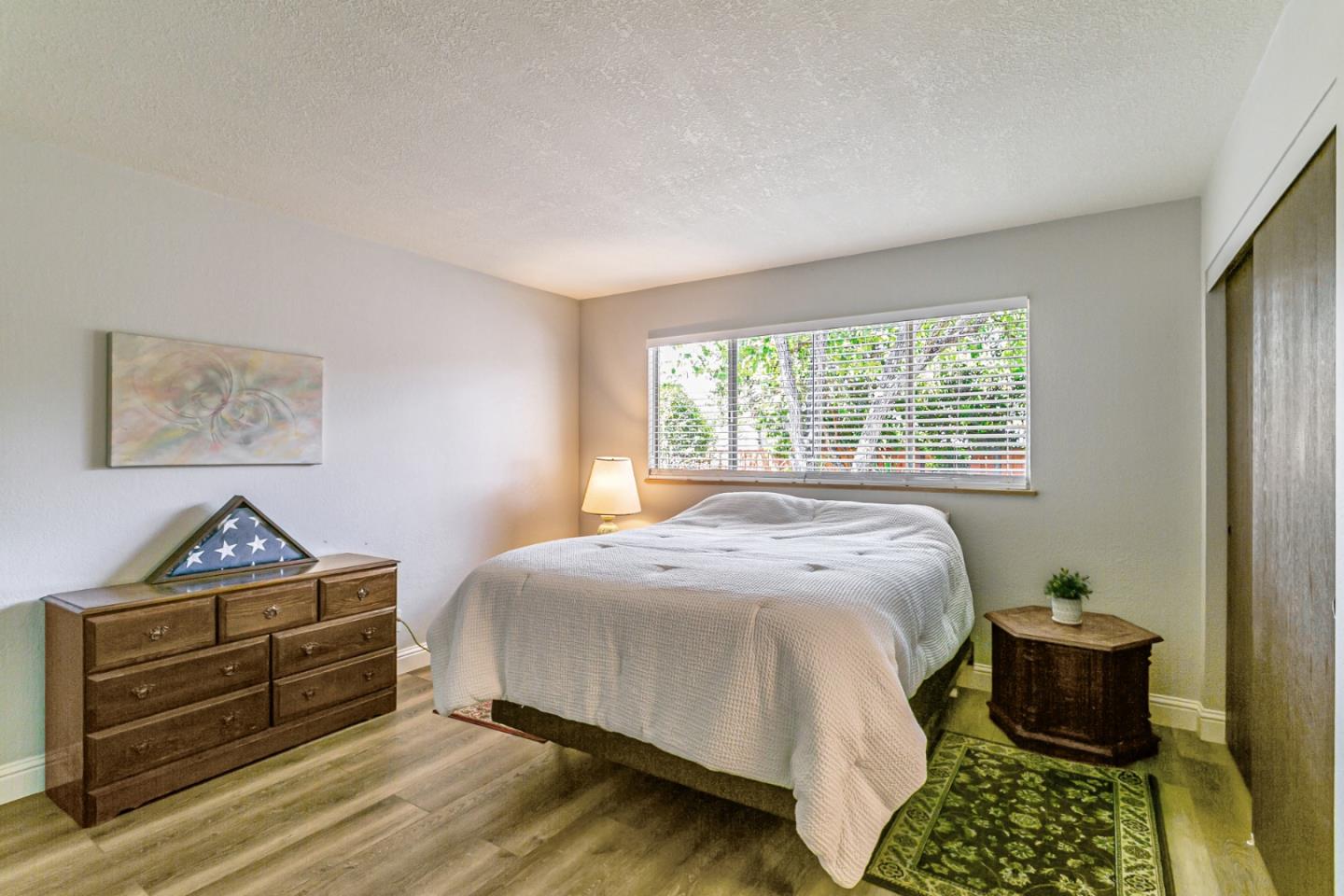 970 Ortega Circle Gilroy, CA 95020 - Photo 14 of 26 a bedroom with a bed and a window