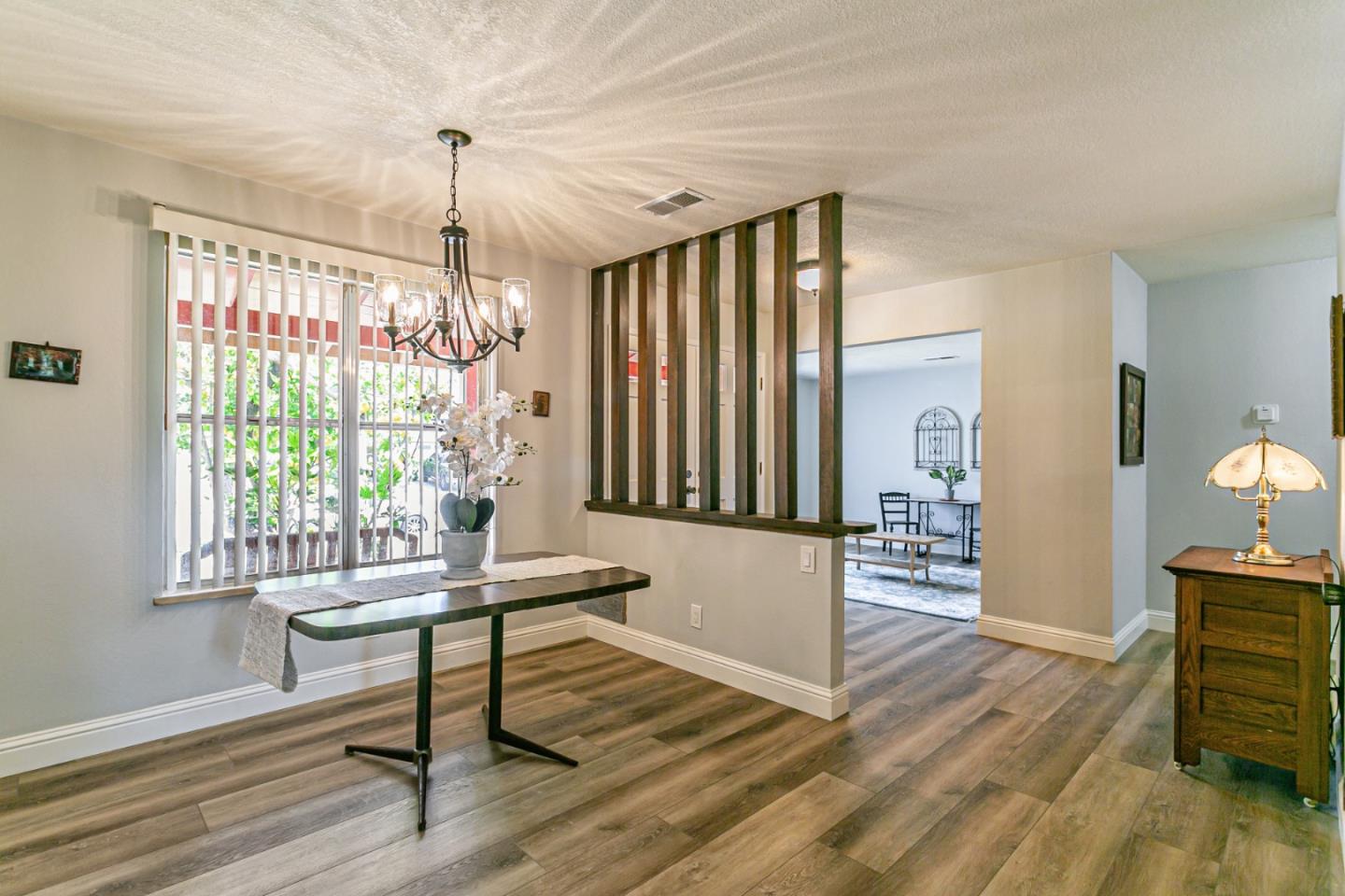 970 Ortega Circle Gilroy, CA 95020 - Photo 9 of 26 a living room with furniture and a window