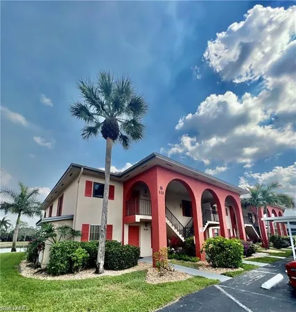 a front view of a house with yard