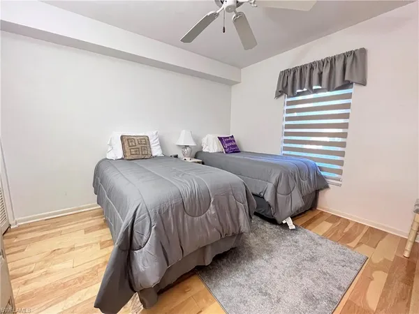 a bedroom with a bed and furniture