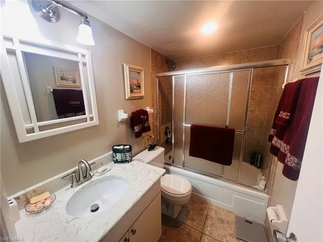 a room with table and chairs