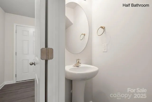 a bathroom with a sink and mirror