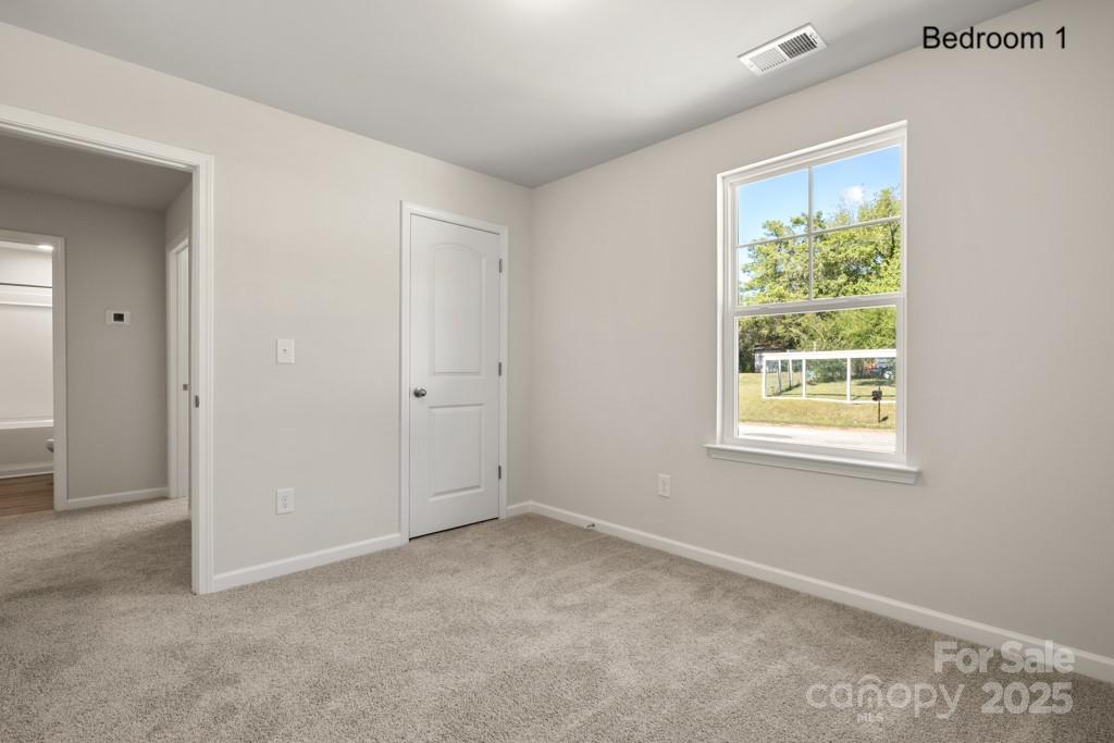 319 Connor Street Lancaster, SC 29720 - Photo 19 of 47 an empty room with a window