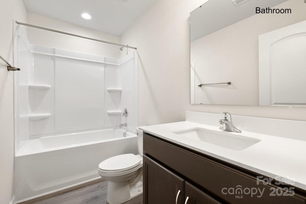 319 Connor Street Lancaster, SC 29720 - Photo 22 of 47 a bathroom with a sink a toilet and a bathtub