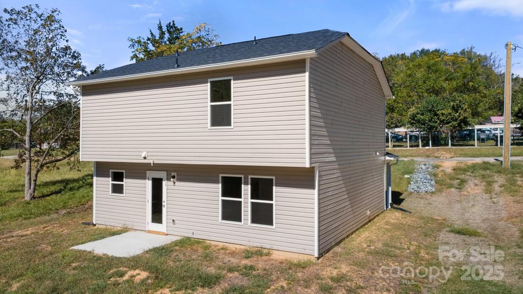 319 Connor Street Lancaster, SC 29720 - Photo 26 of 47 a view of a house with a yard