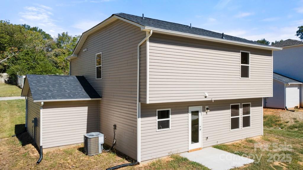 319 Connor Street Lancaster, SC 29720 - Photo 27 of 47 a view of a white house with many windows